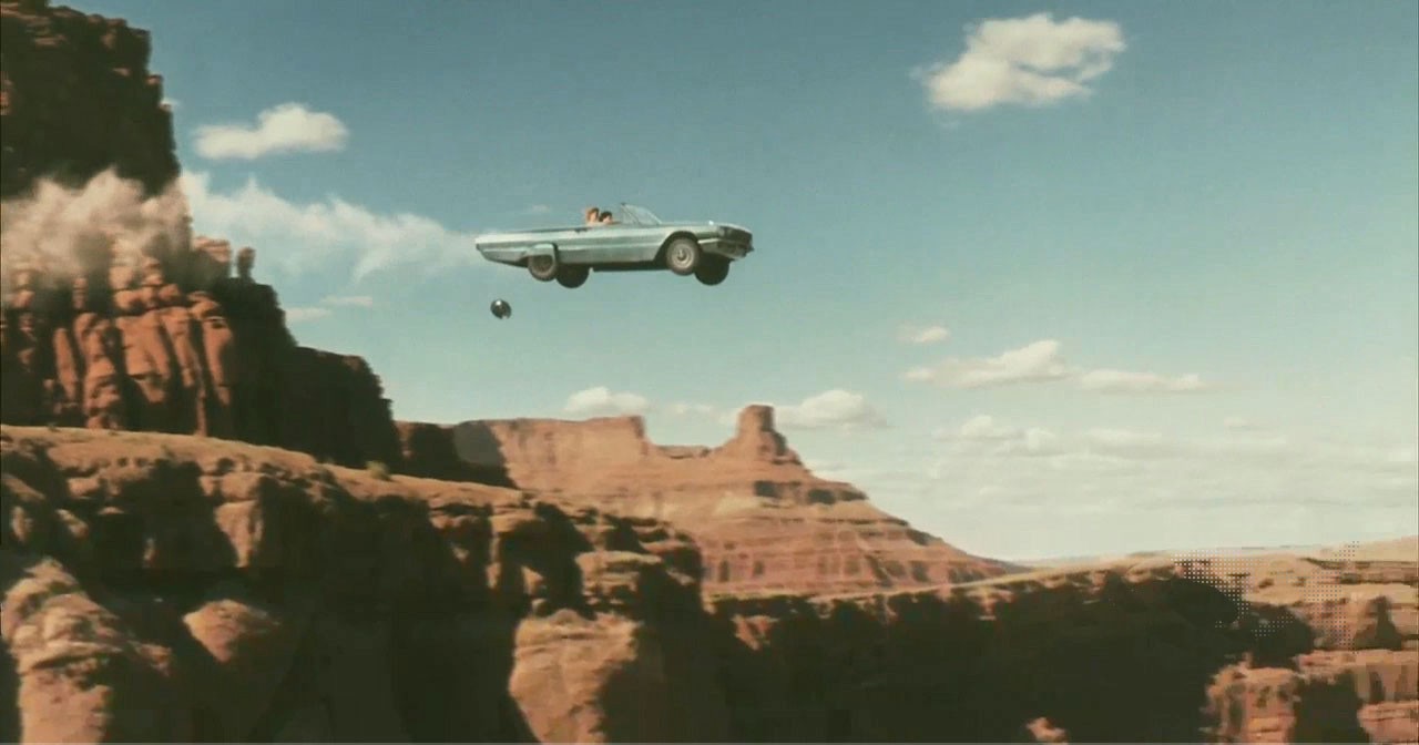 Thelma and Louise driving their car off a cliff at high speed.